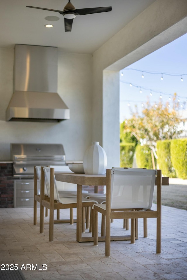 dining area featuring a ceiling fan