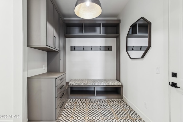 mudroom featuring baseboards