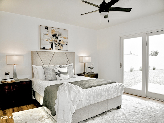 6401 E Eugie Ter, Scottsdale, AZ 85254 - bedroom featuring access to outside, wood finished floors, and a ceiling fan