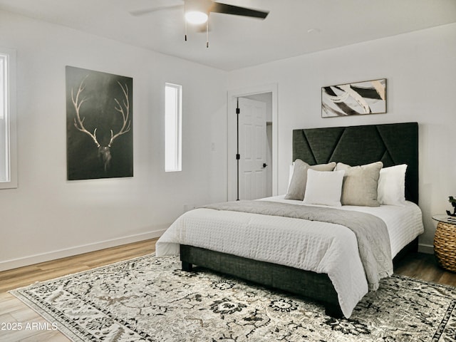 6401 E Eugie Ter, Scottsdale, AZ 85254 - bedroom featuring light wood-type flooring, baseboards, and a ceiling fan