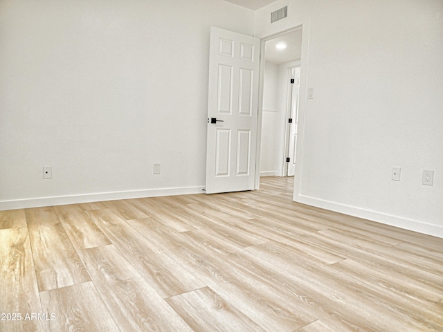 6401 E Eugie Ter, Scottsdale, AZ 85254 - empty room with light wood-style flooring and baseboards