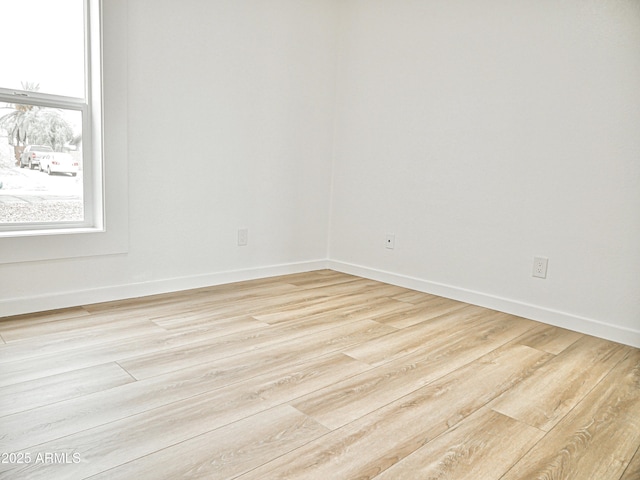 6401 E Eugie Ter, Scottsdale, AZ 85254 - empty room with light wood finished floors and baseboards