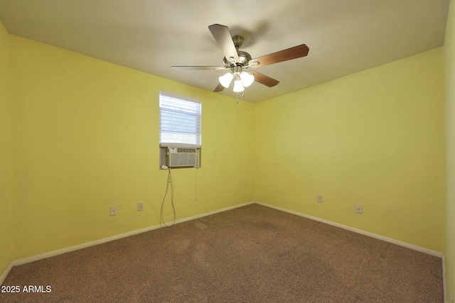 spare room with baseboards, dark colored carpet, cooling unit, and ceiling fan
