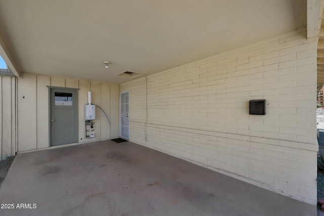 garage with tankless water heater