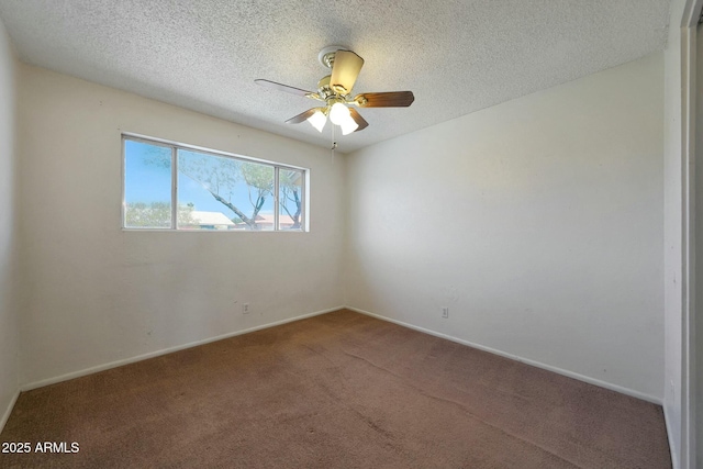 unfurnished room featuring carpet, a textured ceiling, a ceiling fan, and baseboards