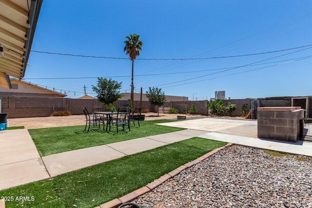 view of yard featuring a fenced backyard and a patio area