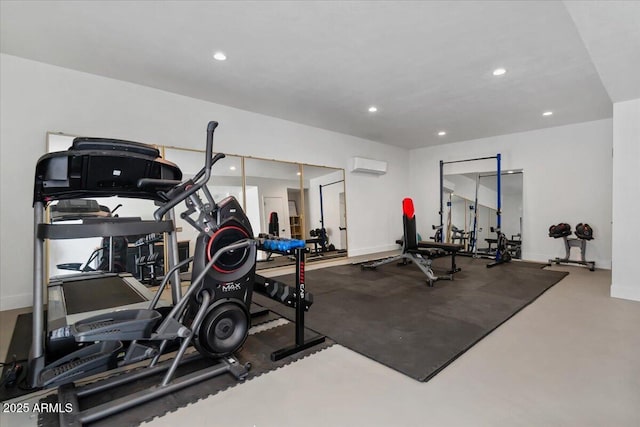 exercise area featuring a wall mounted air conditioner