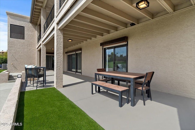 view of patio featuring central AC