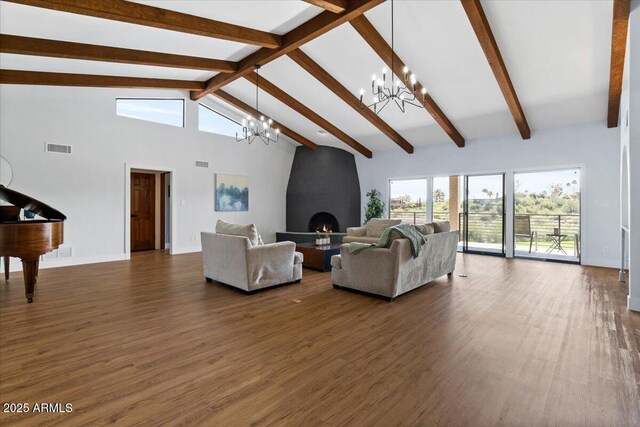 living room with beam ceiling, high vaulted ceiling, an inviting chandelier, a fireplace, and dark hardwood / wood-style floors