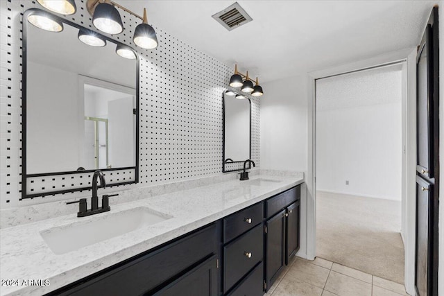 bathroom featuring vanity and tile patterned floors