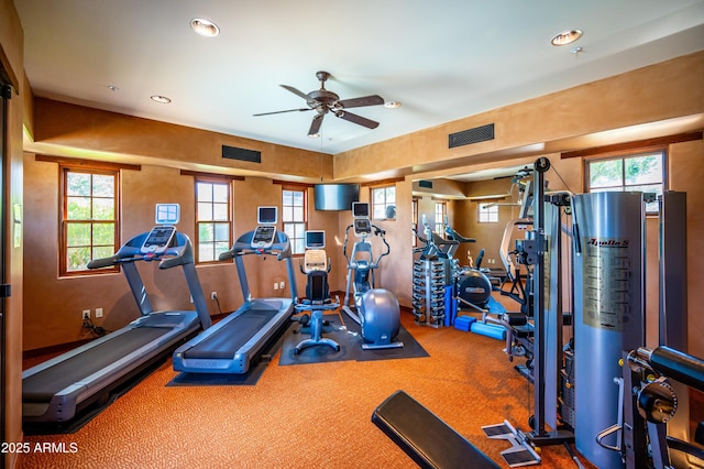 workout area with recessed lighting, visible vents, and a healthy amount of sunlight