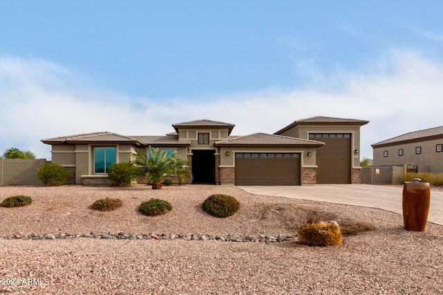 prairie-style home with a garage