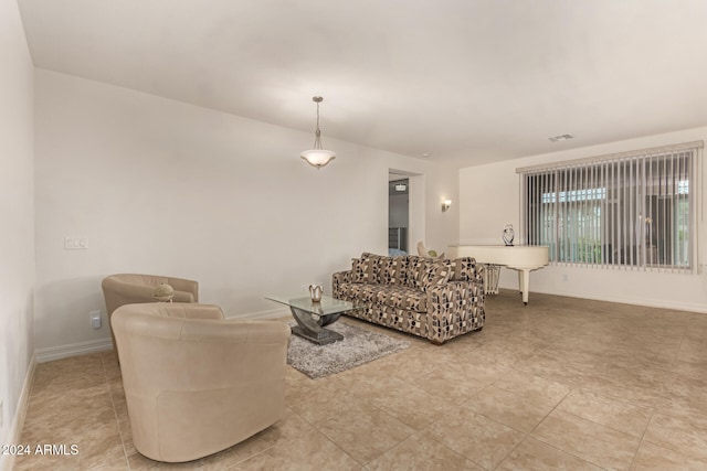 living room featuring light tile patterned floors