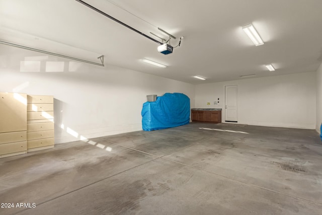 garage featuring a garage door opener