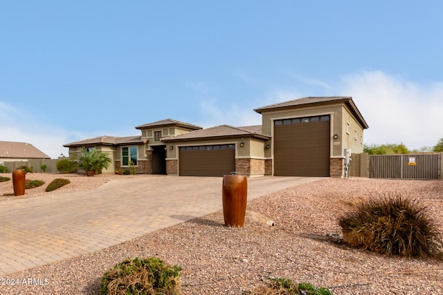 prairie-style home with a garage