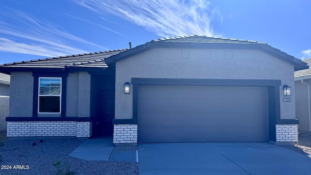 view of front of property featuring a garage