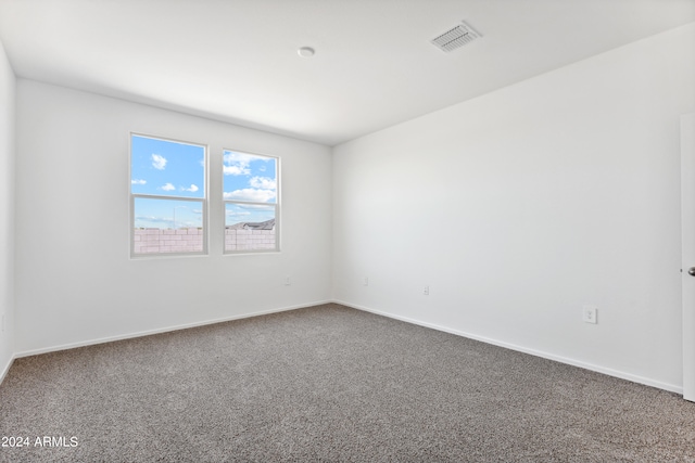 unfurnished room featuring carpet floors