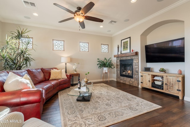 1617 E Copper Holw, Queen Creek, AZ 85140 - living area with a ceiling fan, a glass covered fireplace, hardwood / wood-style flooring, recessed lighting, and crown molding