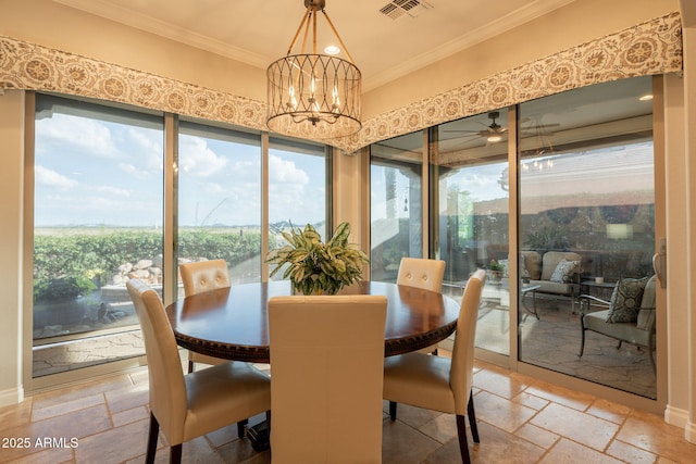 1617 E Copper Holw, Queen Creek, AZ 85140 - dining space with stone tile flooring, crown molding, and a chandelier