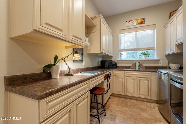 1617 E Copper Holw, Queen Creek, AZ 85140 - kitchen with separate washer and dryer, open shelves, dark countertops, stone finish floors, and range