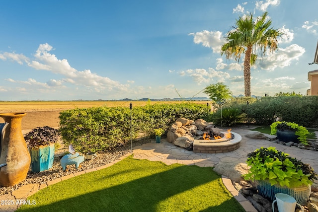 1617 E Copper Holw, Queen Creek, AZ 85140 - view of grassy yard with a rural view and a fire pit