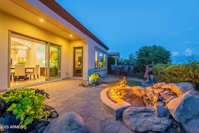 1617 E Copper Holw, Queen Creek, AZ 85140 - view of patio / terrace with an outdoor fire pit and outdoor dining area