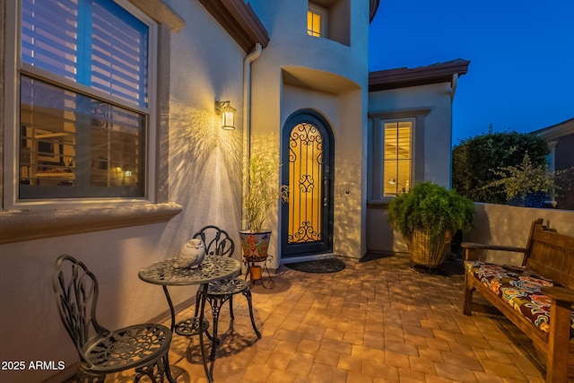 1617 E Copper Holw, Queen Creek, AZ 85140 - property entrance featuring stucco siding and a patio area