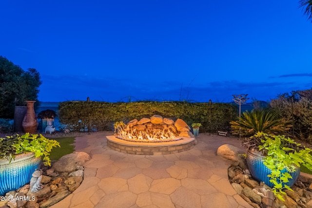 1617 E Copper Holw, Queen Creek, AZ 85140 - patio at twilight with a patio and a fire pit