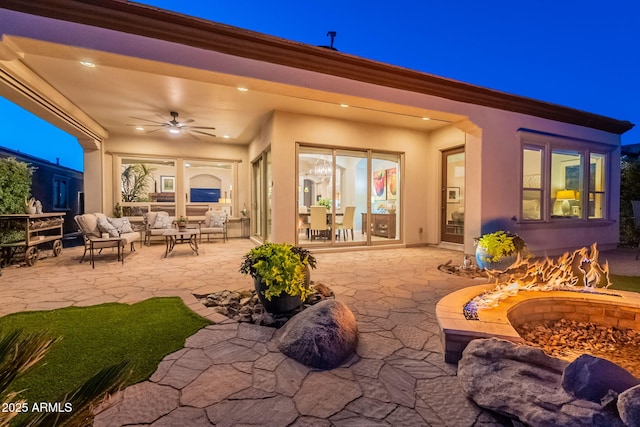 1617 E Copper Holw, Queen Creek, AZ 85140 - view of patio / terrace with an outdoor living space with a fire pit and a ceiling fan