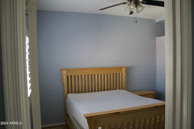 bedroom featuring ceiling fan