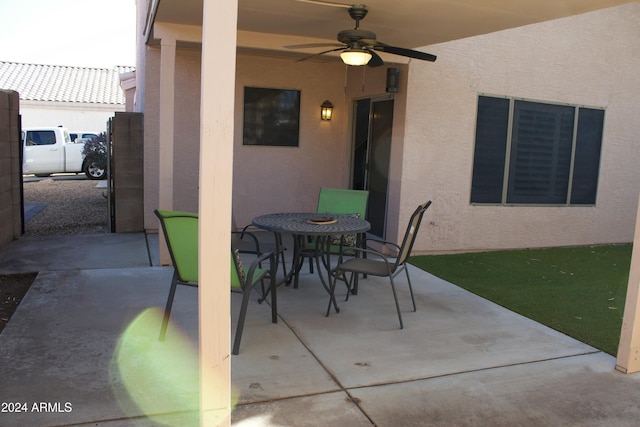 view of patio featuring ceiling fan