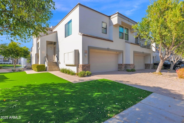 view of front facade featuring a garage and a front lawn