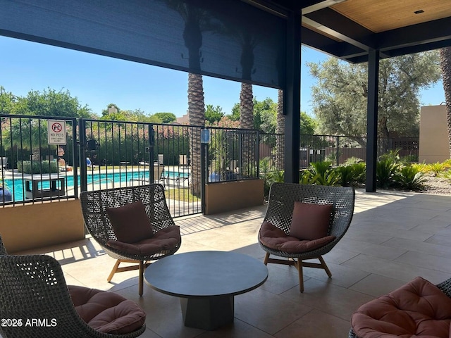 view of patio / terrace featuring a community pool