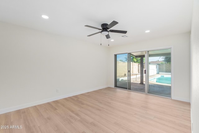 unfurnished room with recessed lighting, visible vents, light wood-style floors, a ceiling fan, and baseboards