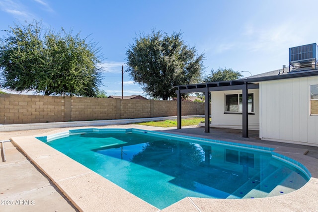 view of pool featuring a fenced in pool, a fenced backyard, a patio, and central air condition unit