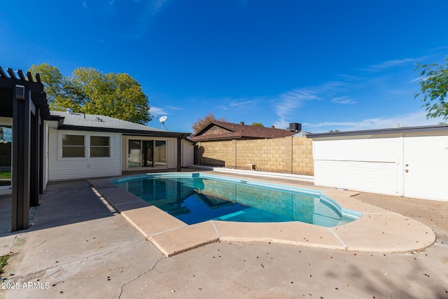 view of swimming pool featuring a fenced in pool, a patio area, and fence