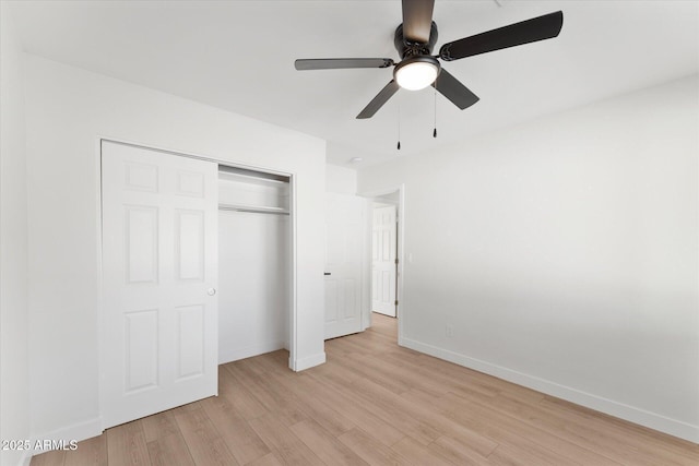 8419 N 51st Dr, Glendale, AZ 85302 - unfurnished bedroom with a closet, a ceiling fan, light wood-type flooring, and baseboards