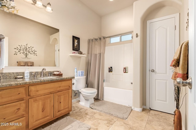 bathroom featuring shower / bathtub combination with curtain, vanity, toilet, and tile patterned floors