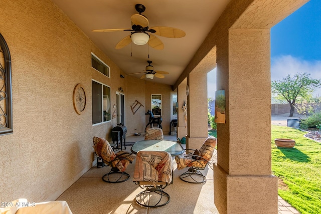 view of patio featuring a ceiling fan