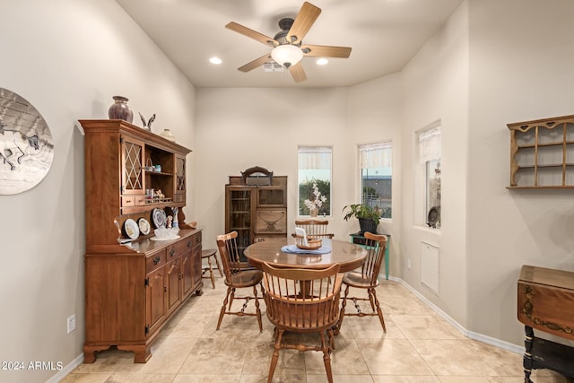 dining area with recessed lighting, ceiling fan, baseboards, and light tile patterned floors