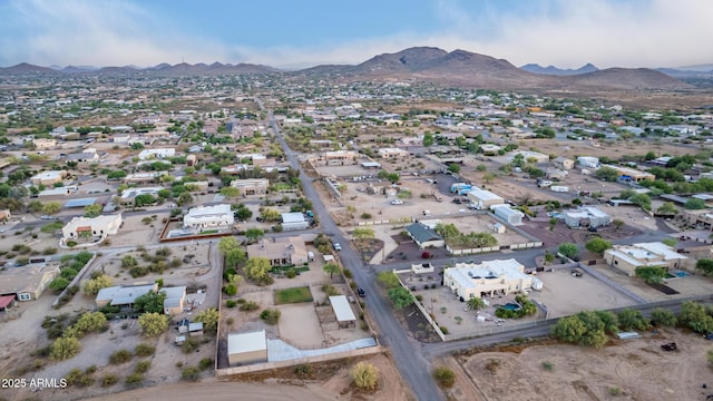 birds eye view of property with a residential view and a mountain view