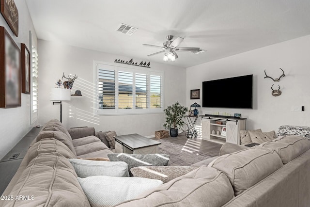 living room featuring ceiling fan