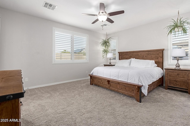 bedroom with light carpet and ceiling fan