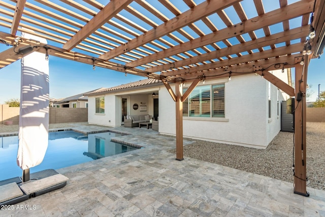 view of swimming pool with outdoor lounge area, a jacuzzi, a patio area, and a pergola