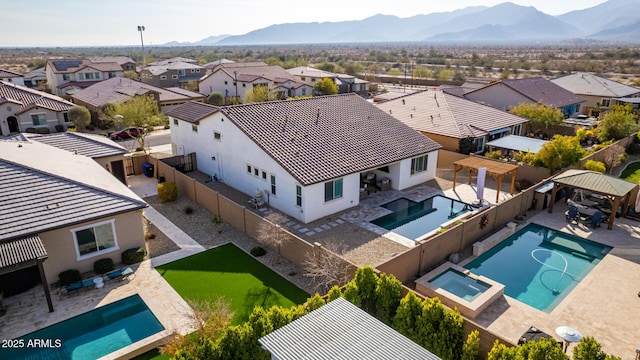 drone / aerial view with a mountain view