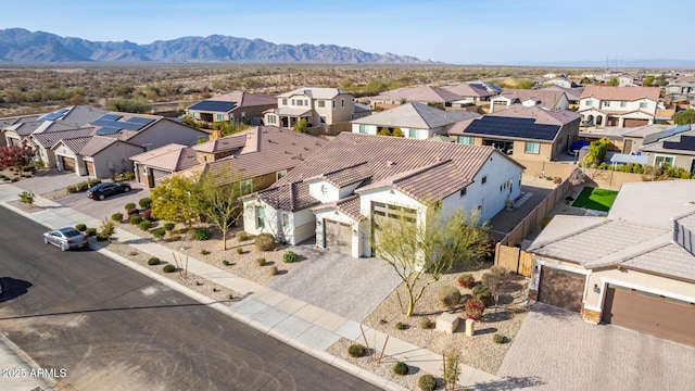 drone / aerial view featuring a mountain view