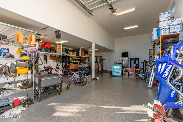 garage featuring a garage door opener