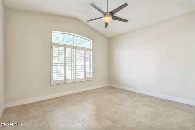 14452 N 98th Pl, Scottsdale, AZ 85260 - empty room featuring ceiling fan, vaulted ceiling, and light tile patterned floors