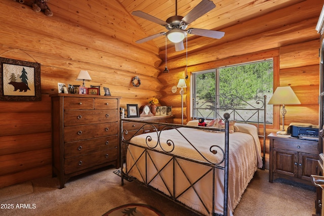 bedroom with lofted ceiling and carpet