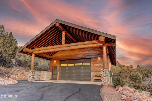 view of front of property featuring a garage